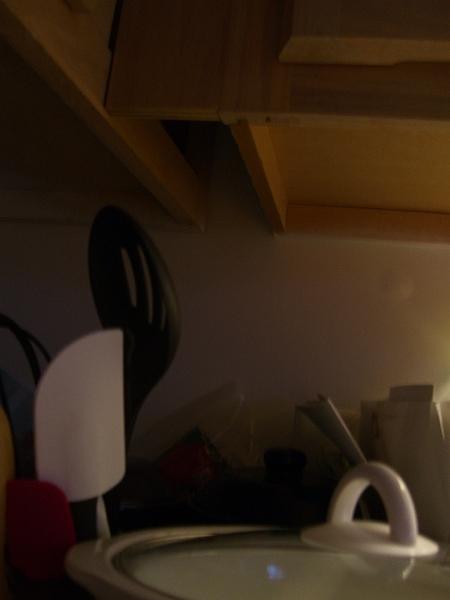 CIMG1692.JPG - This is the opening that lets him get into the cabinet.
