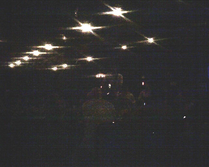 Photo_112907_001.jpg - Cameraphone picture of Stephen Kellogg and the Sixers doing their second encore, acoustic, standing on chairs in the middle of the Birchmere audience.